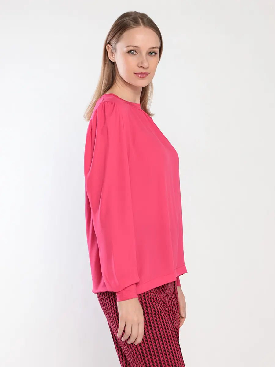 Блуза свободного кроя розового цвета